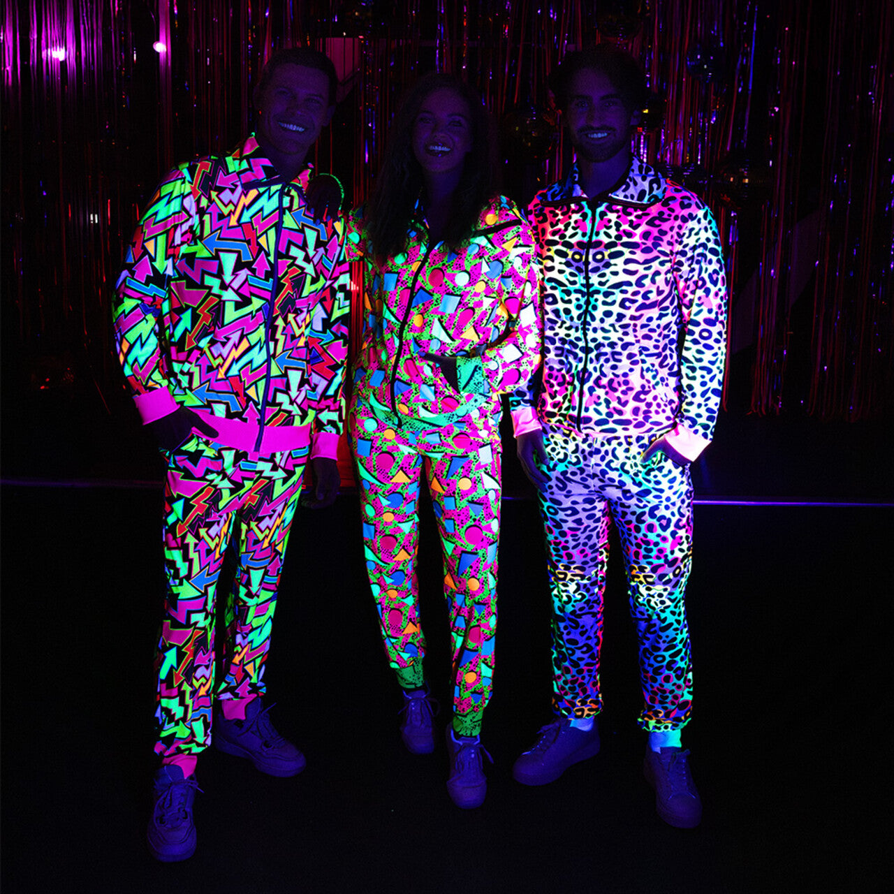 Op deze afbeelding zie je een Kostuums, van het merk Boland. Super Fout 90s Trainingspak Leopard Art Blacklight Vrouw Kostuum