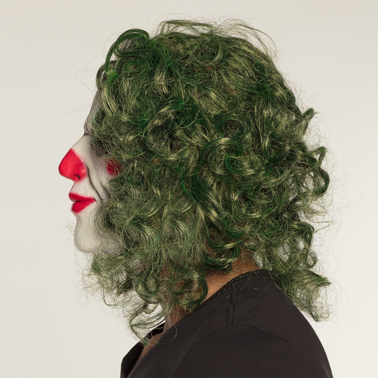 Op deze afbeelding zie je een Accessoires, van het merk Boland. Masker Met Haar De Grappige Clown Schurk