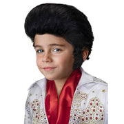 Op deze afbeelding zie je een Accessoires, van het merk Funidelia. Vegas King Elvis Pruik Kind