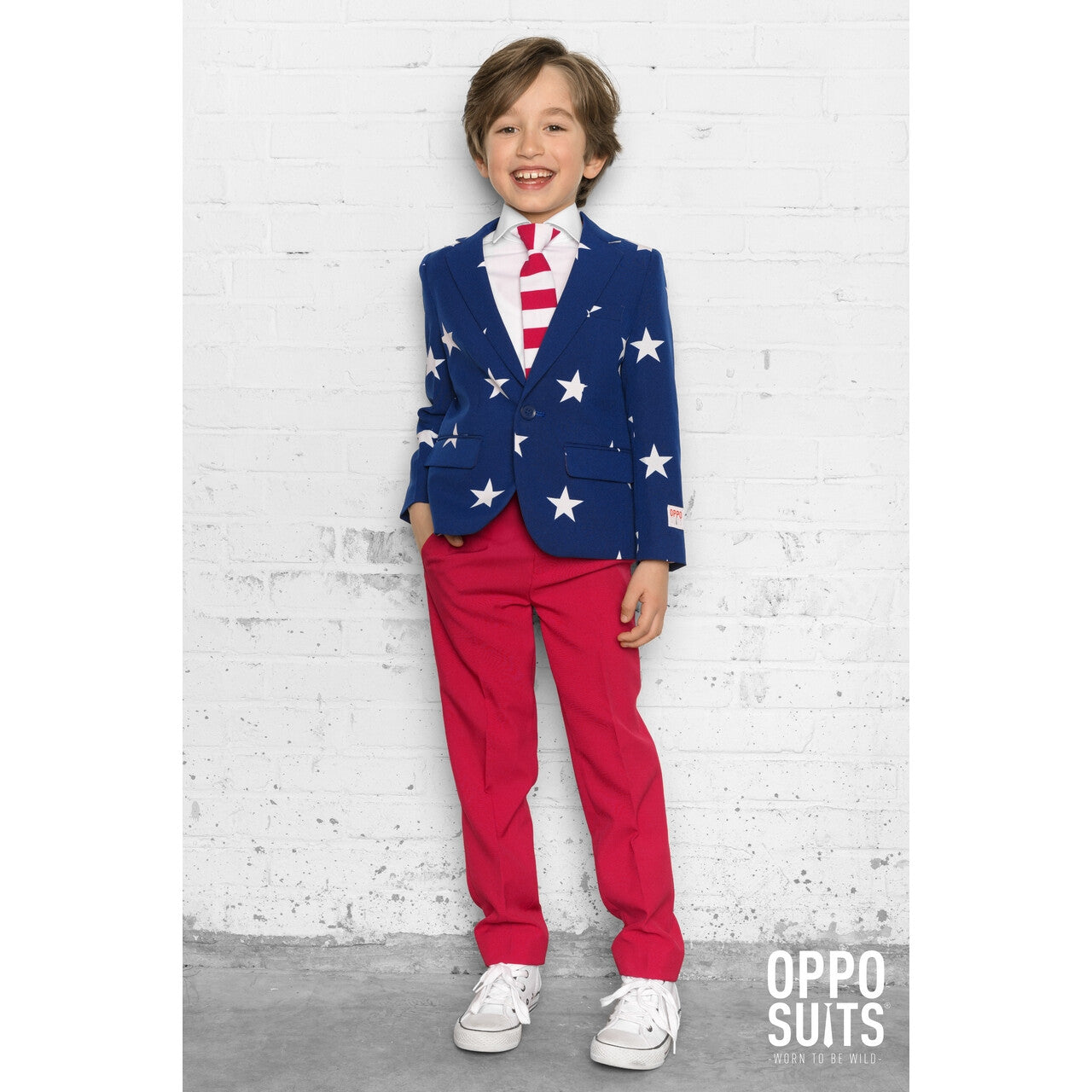 Op deze afbeelding zie je een Kostuums, van het merk Opposuits. Stars & Stripes USA Jongen Kostuum