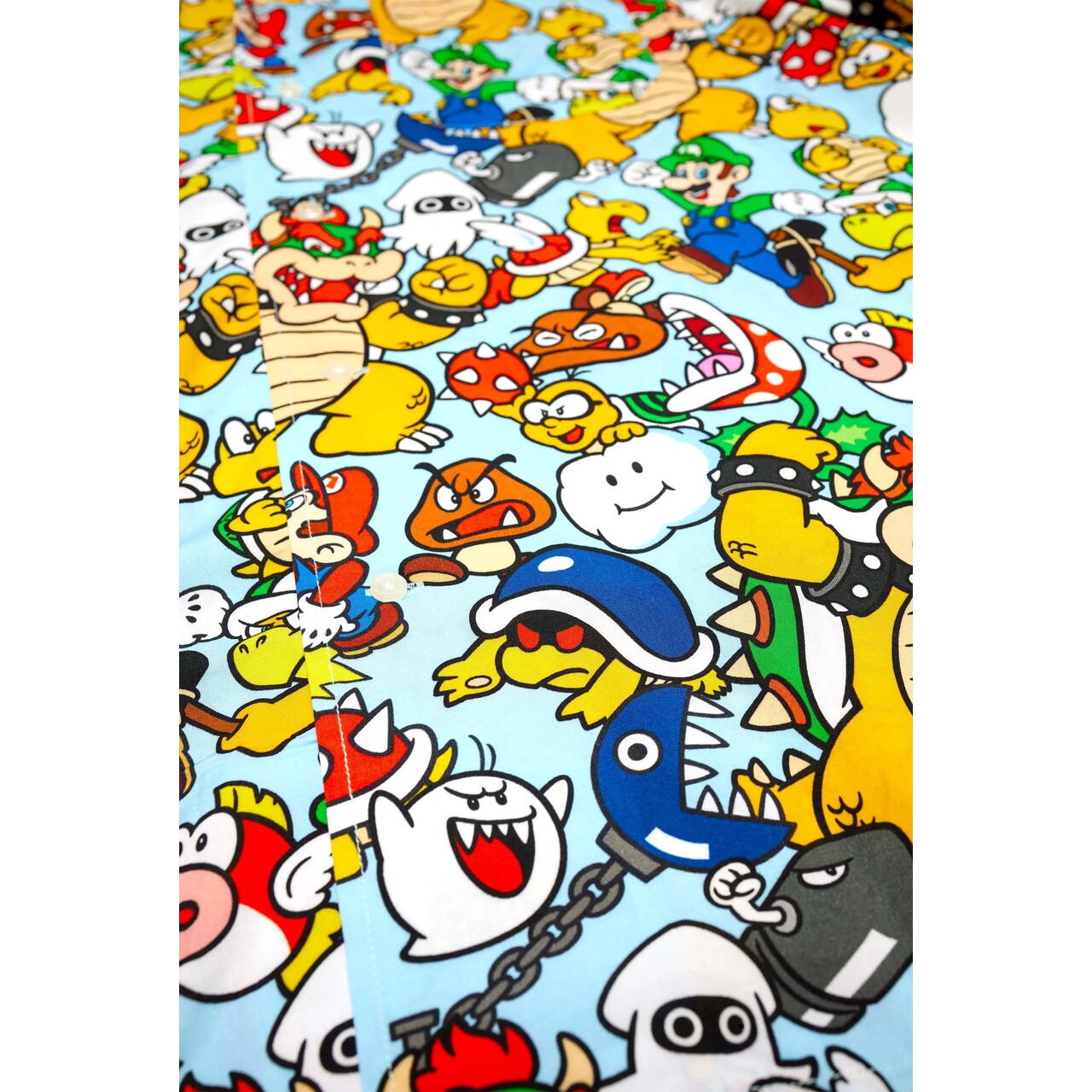 Op deze afbeelding zie je een Kostuums, van het merk Opposuits. Bowsers™ Kingdom Super Mario™ Iconen Blouse Man