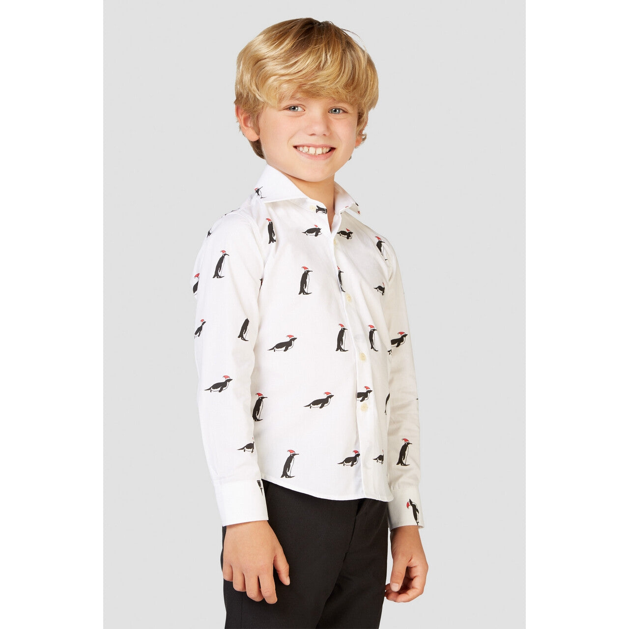 Op deze afbeelding zie je een Kostuums, van het merk Opposuits. Witte Snowy Christmas Penguins Blouse Jongen