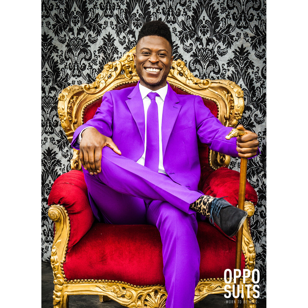 Op deze afbeelding zie je een Kostuums, van het merk Opposuits. Paars Purple Prince Opposuit Kostuum Man