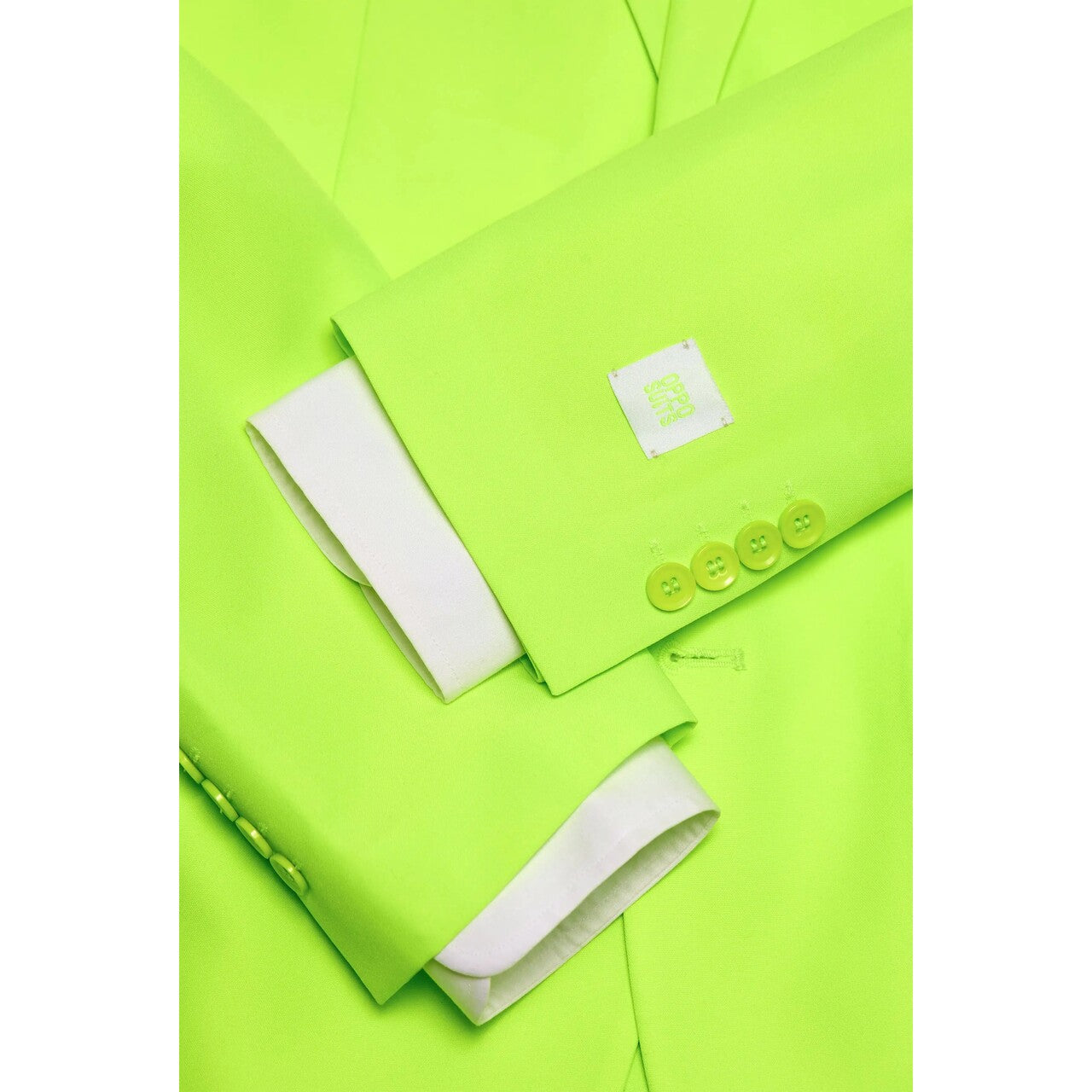 Op deze afbeelding zie je een Kostuums, van het merk Opposuits. Neon Lucky Lime Lucas Man Kostuum