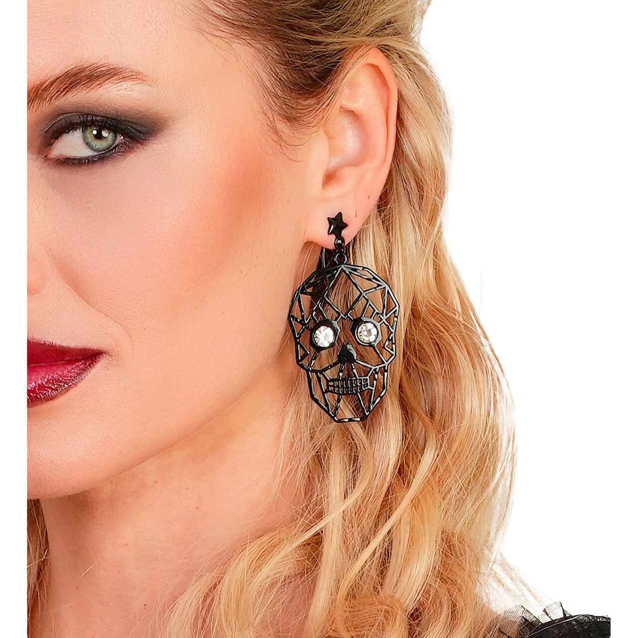 Op deze afbeelding zie je een Accessoires, van het merk Widmann. Skull Eyes Strass Oorbellen