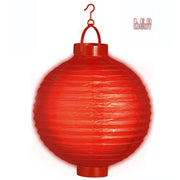 Op deze afbeelding zie je een Decoratie, van het merk Widmann. Feestelijke Lampion Met Licht 30 Centimeter Rood