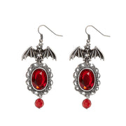 Op deze afbeelding zie je een Accessoires, van het merk Widmann. Halloween Accessoire Vleermuis Oorringen Met Rode Steen