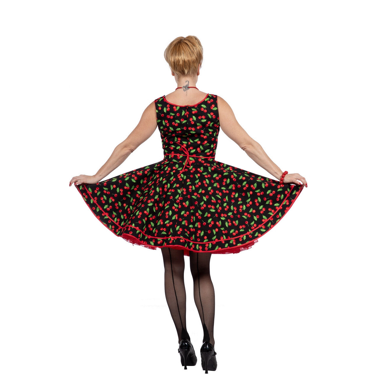 Op deze afbeelding zie je een Kostuums, van het merk Wilbers. Rockabilly Jurk Fruitige Vrouw